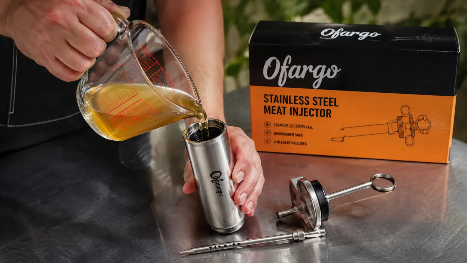 Hand filling Ofargo stainless injector barrel with apple juice marinade in a glass measuring cup